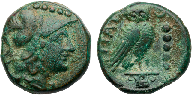 This coin is covered with green oxide.  The obverse is another helmeted Minerva, surmounted by a horizontal row of five dots.  The reverse has a picture of an owl, and, on the right, a column of five dots.